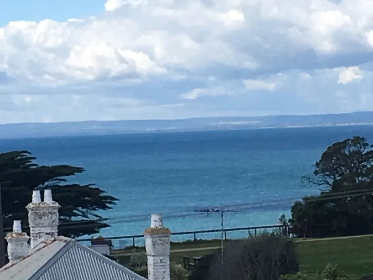 The view over the rooftops to the water